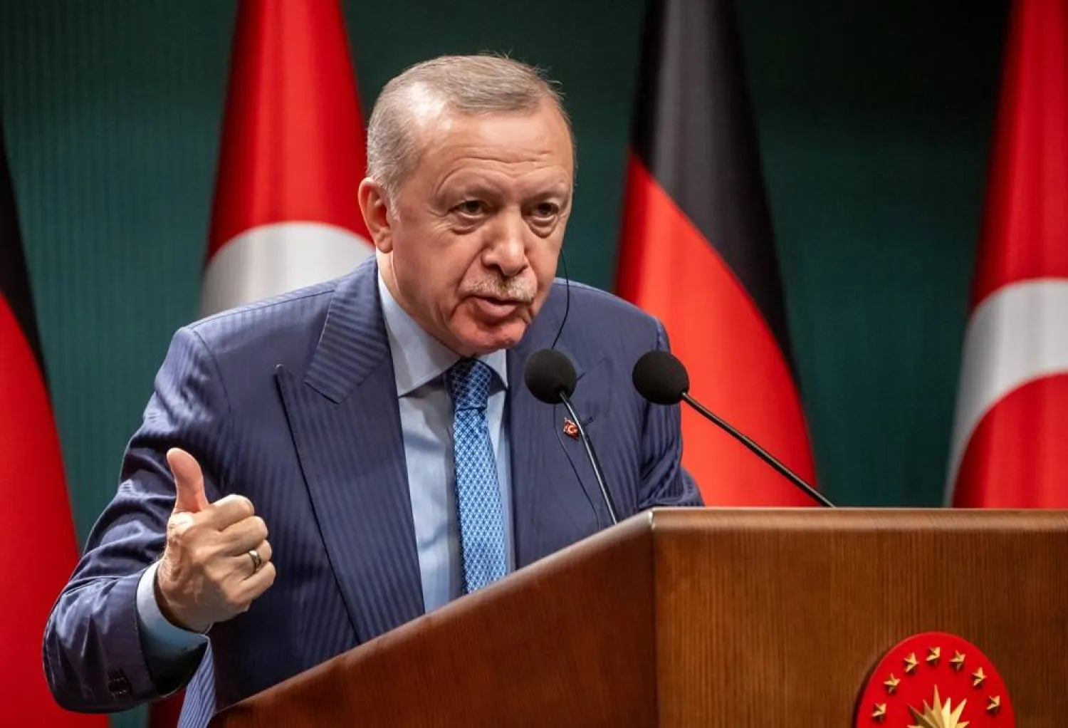 30 October 2025, Türkiye, Ankara: Recep Tayyip Erdogan, President of Türkiye, speaks at the press conference with German Chancellor Friedrich Merz after talks at the presidential palace. (dpa) 