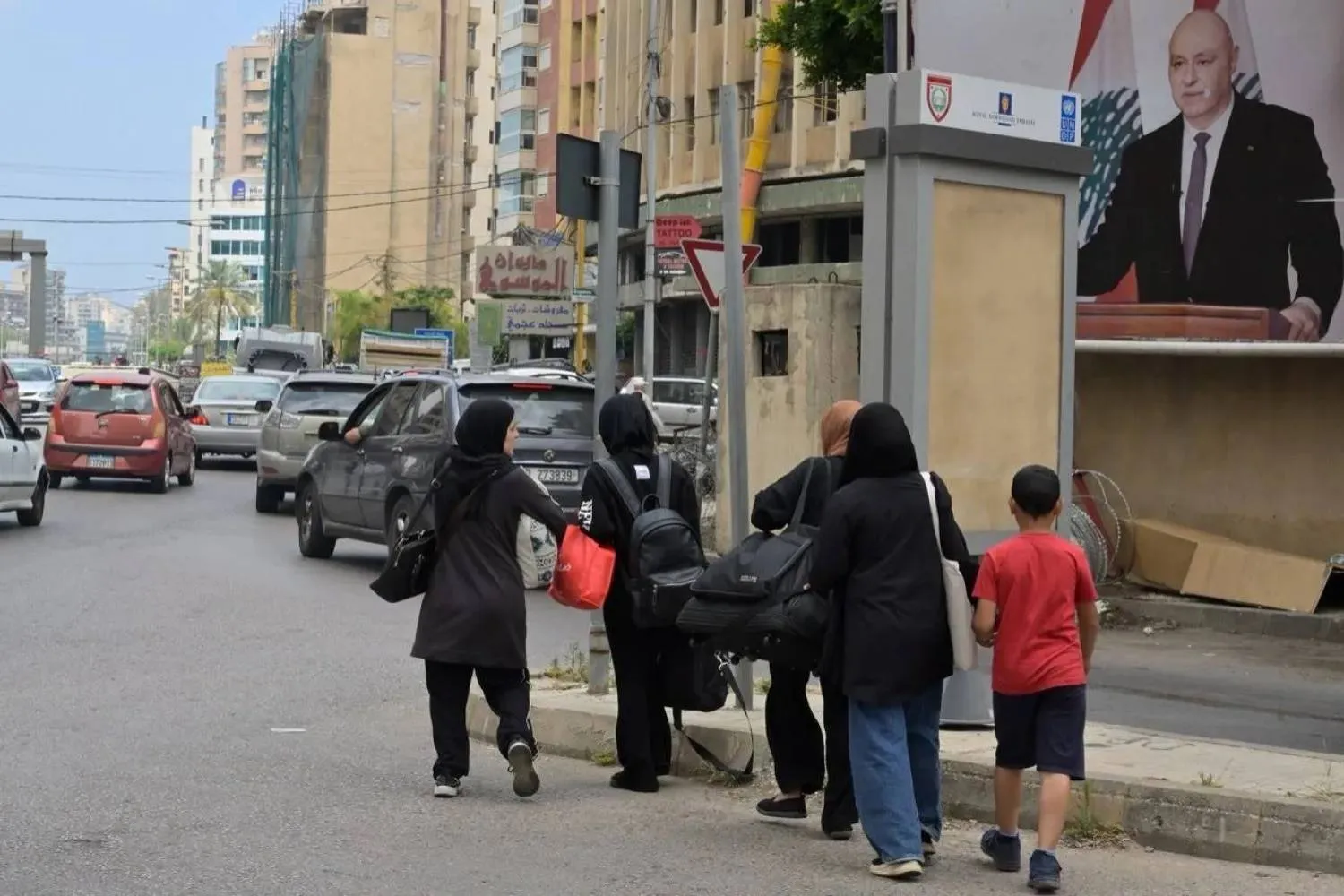 Families leave Beirut’s southern suburbs after Netanyahu ordered strikes on the area in Lebanon (Asharq Al-Awsat) 