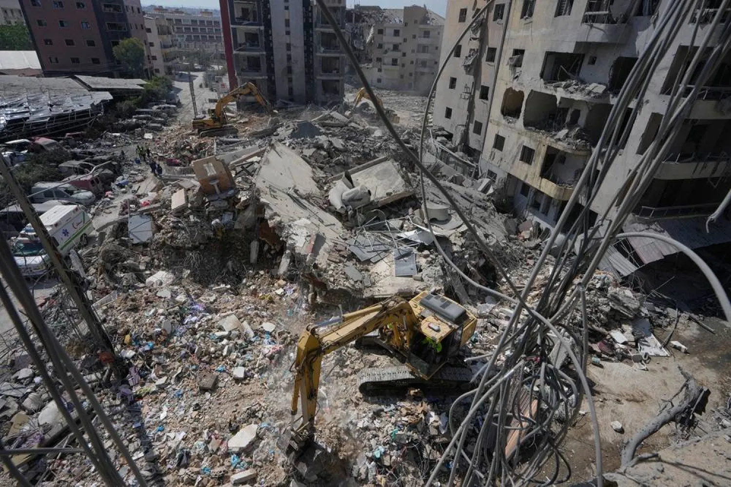  Rescue workers use excavators, as they search for victims under the rubble of a building that was hit Monday in an Israeli airstrike in the southern port city of Tyre, Lebanon, Tuesday, June 2, 2026. (AP) 