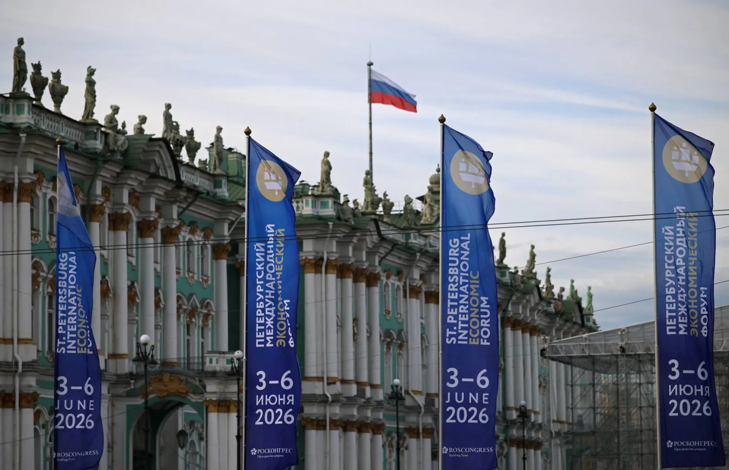 Flags with the logo of the St. Petersburg International Economic Forum (SPIEF) fly in front of the State Hermitage Museum on the eve of the forum's opening in Saint Petersburg, Russia June 2, 2026. (Reuters)