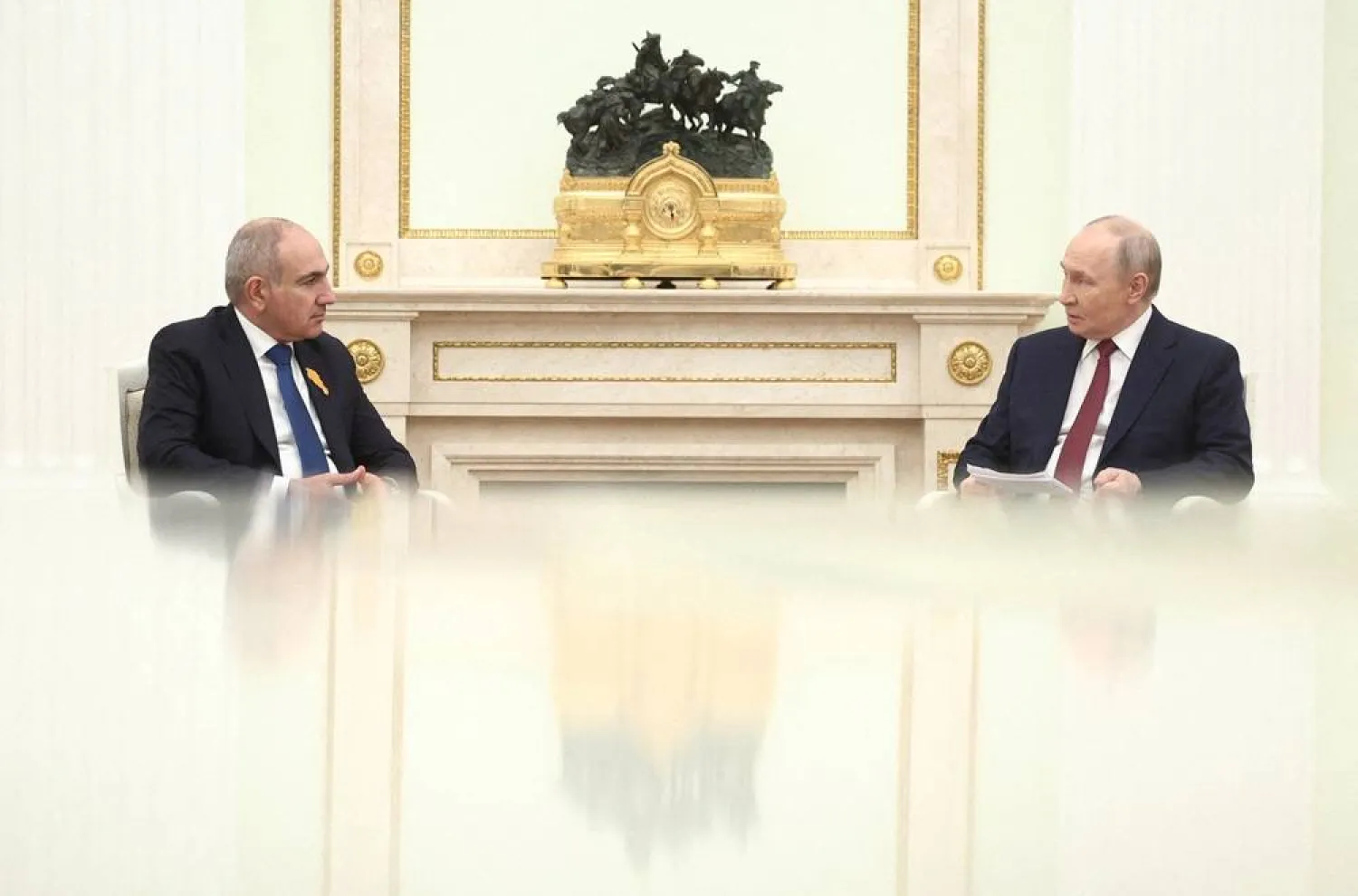 Russian President Vladimir Putin and Armenian Prime Minister Nikol Pashinyan attend a meeting at the Kremlin in Moscow, Russia, April 1, 2026. (Sputnik/Sofya Sandurskaya/Pool via Reuters)