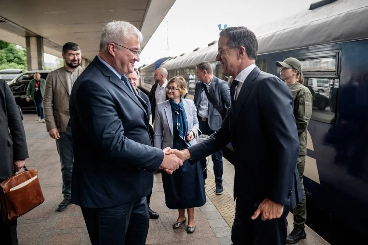 In this handout photograph taken and released by the Ukrainian Foreign Ministry on June 3, 2026, Ukraine's Foreign Minister Andrii Sybiha (L) greets NATO Secretary General Mark Rutte (R) upon his arrival in Kyiv, amid the Russian invasion of Ukraine. (Handout / Ukrainian Foreign Ministry / AFP) 