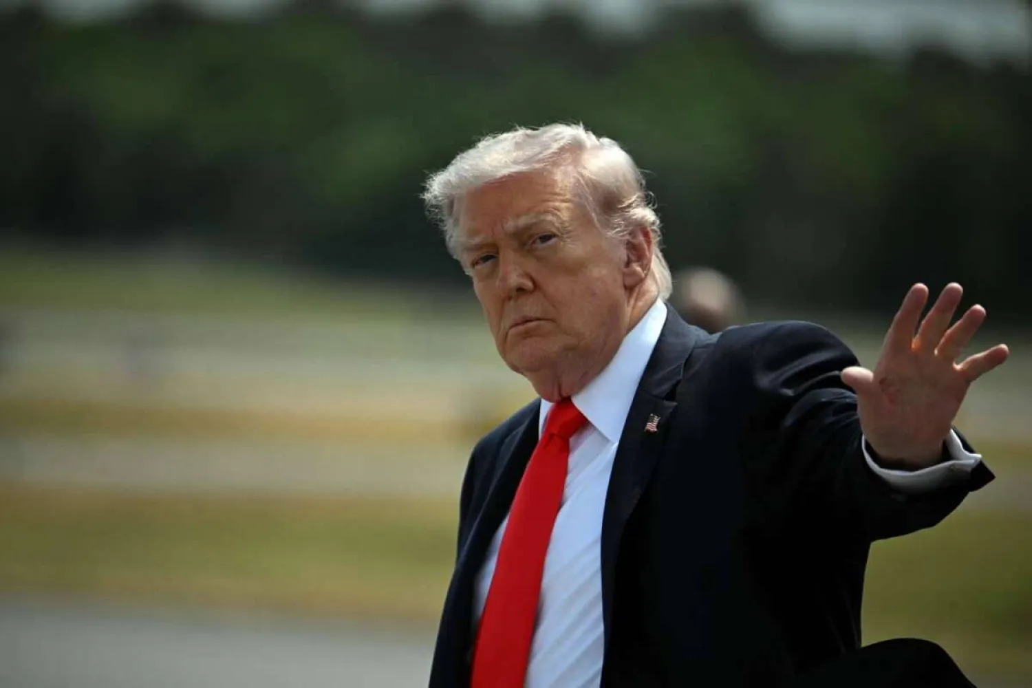 President Donald Trump waves after his arrival at Ocala International Airport, in Ocala, Florida on May 1, 2026. (Getty Images/AFP)