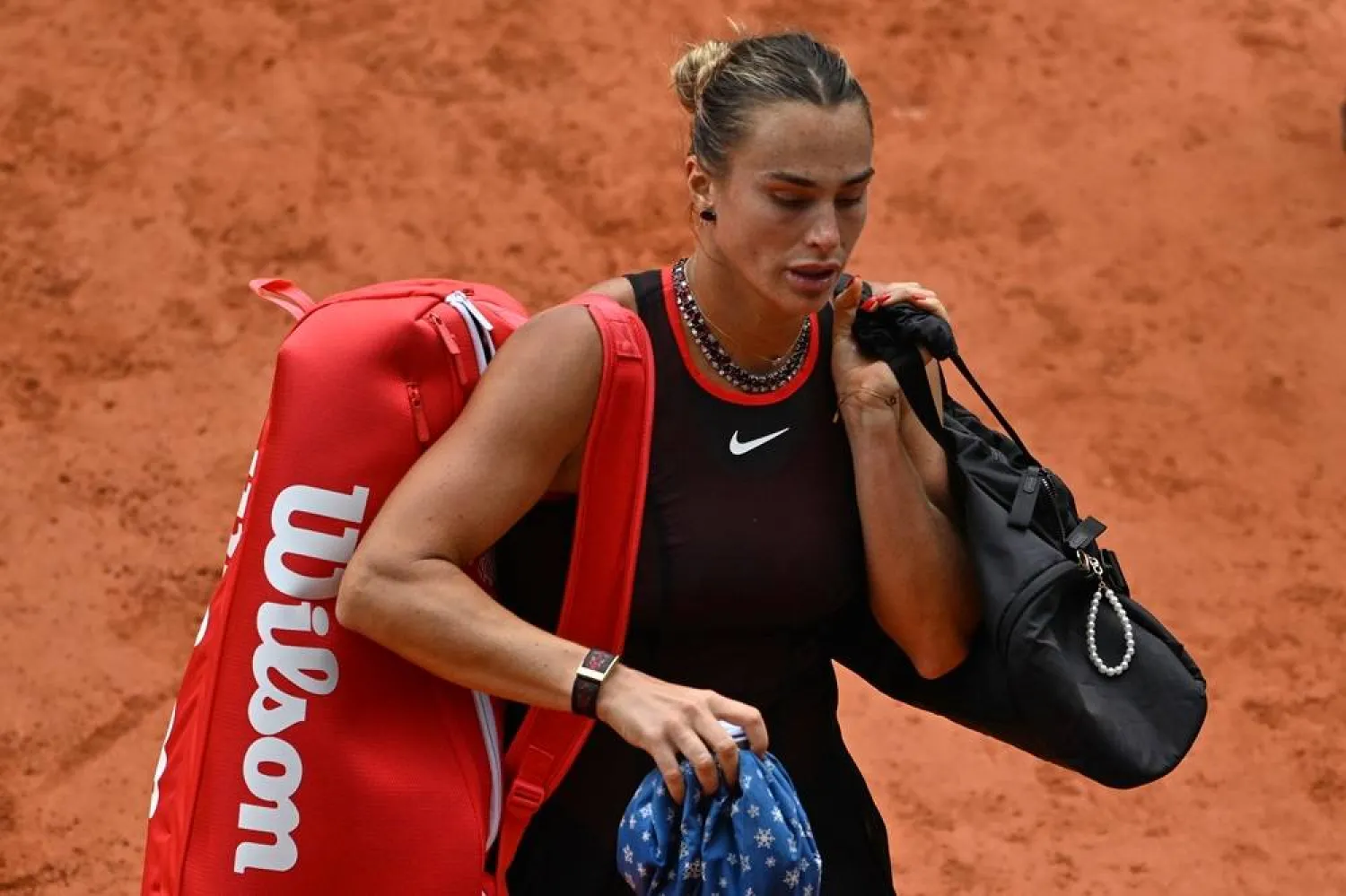  Aryna Sabalenka of Belarus walks off the court after the quarterfinal tennis match against Russia's Diana Shnaider at the French Open in Paris, Wednesday, June 3, 2026. (AP) 