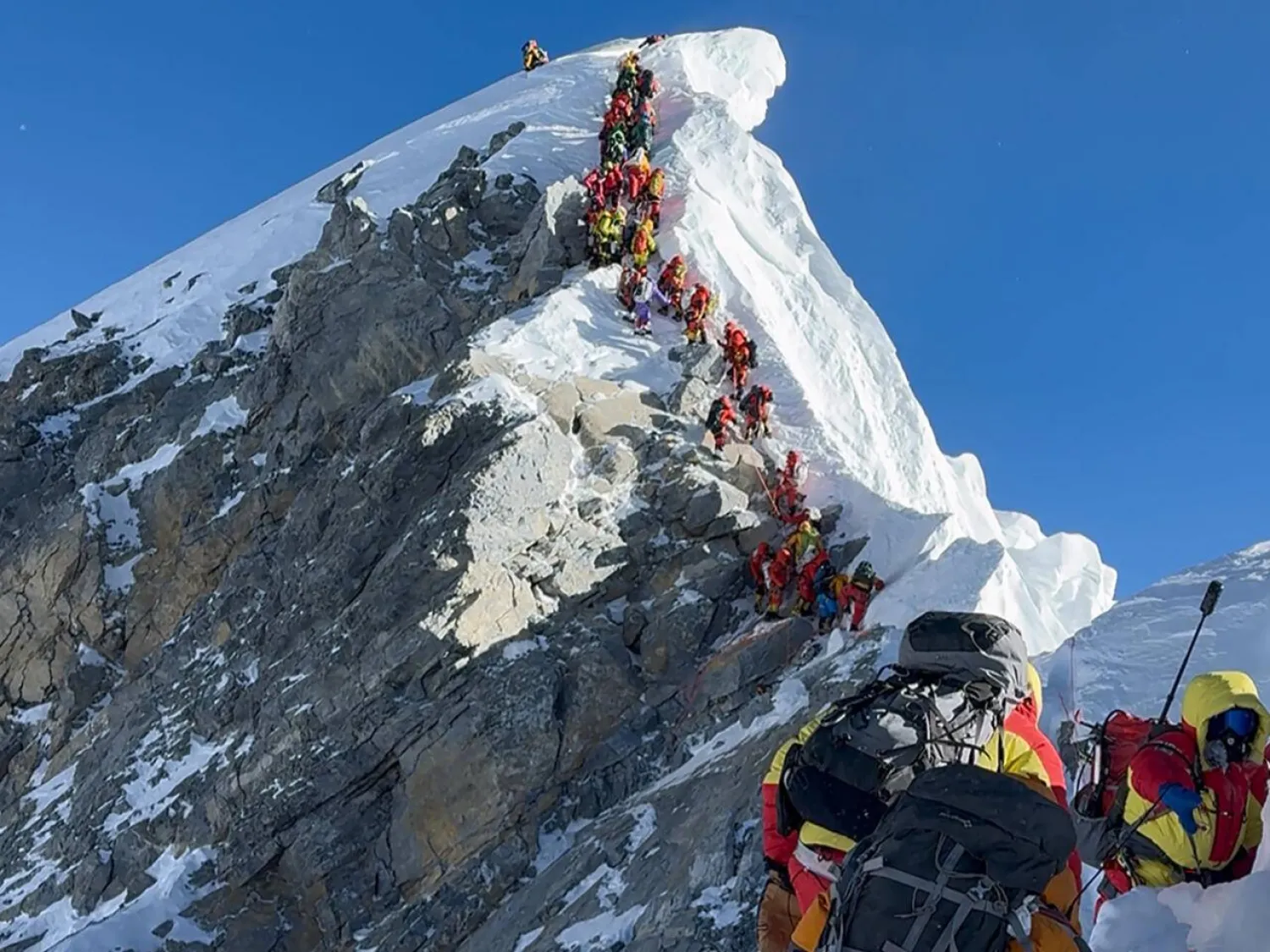 This photograph taken on May 20, 2026, shows mountaineers on Everest. Furte Sherpa / AFP
