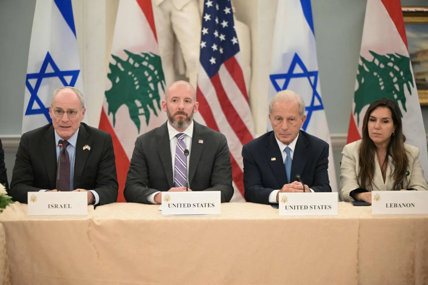 (L/R) Israel's Ambassador to the US Yechiel Leiter, State Department Chief of Staff Daniel Holler, US Ambassador to Lebanon Michel Issa and Lebanese Ambassador to the US Nada Hamadeh attend a meeting between Israeli and Lebanese delegations hosted by the United States at the State Department in Washington, DC, on June 3, 2026. (Photo by Oliver Contreras / AFP)