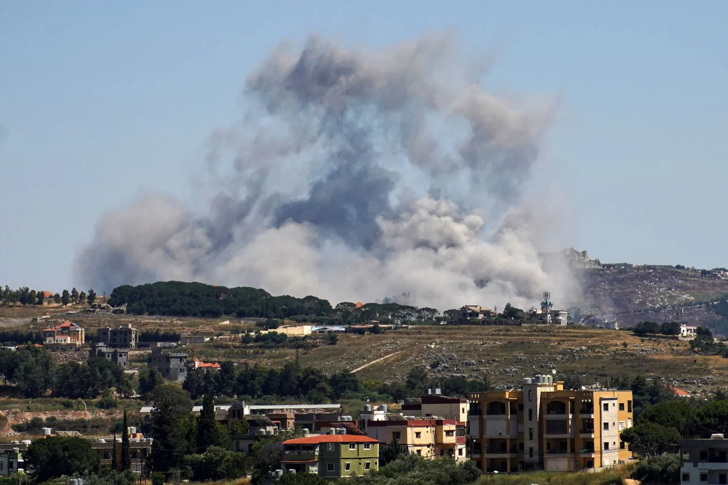A photograph taken from the southern area of Nabatieh shows smoke rising from the site of an Israeli airstrike in the village of Kfar Tibnit on June 4, 2026. (Photo by Abbas Fakih / AFP)