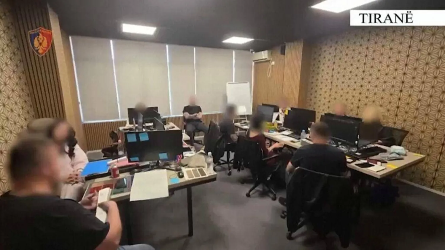 This image taken from a handout video released by Albanian police shows operators in an alleged cryptocurrency scam call center in Tirana in April 2026. Handout / ALBANIA POLICE/AFP
