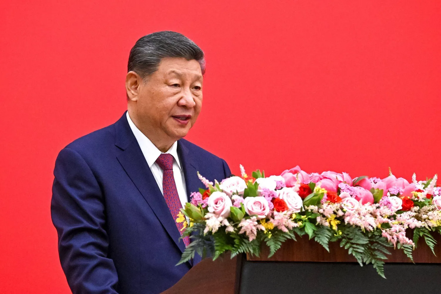 In this pool photograph distributed by the Russian state agency Sputnik, China's President Xi Jinping gives a speech during the opening ceremony of the Years of Russian-Chinese Cooperation in Education in Beijing on May 20, 2026. (Photo by Kristina Solovyova / POOL / AFP)