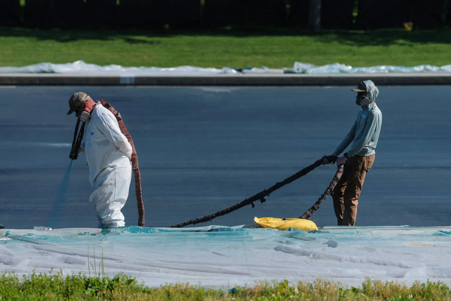 Workers continue putting the finishing touches on the Lincoln Memorial Reflecting Pool on June 04, 2026 in Washington, DC. (Getty Images/AFP)