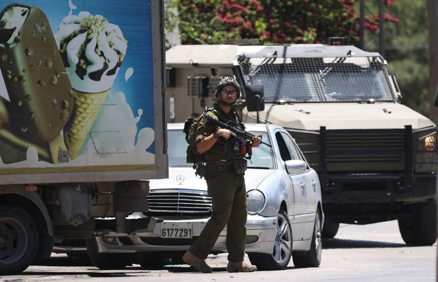 An Israeli soldier takes position during a raid in the West Bank city of Nablus, 01 June 2026. (EPA)