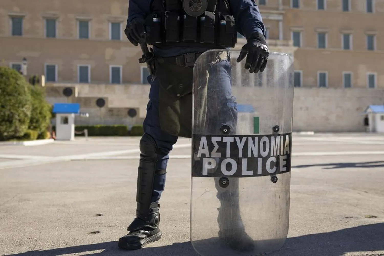 20 November 2024, Greece, Athens: A Greek police officer stands guard during a security deployment. (dpa)