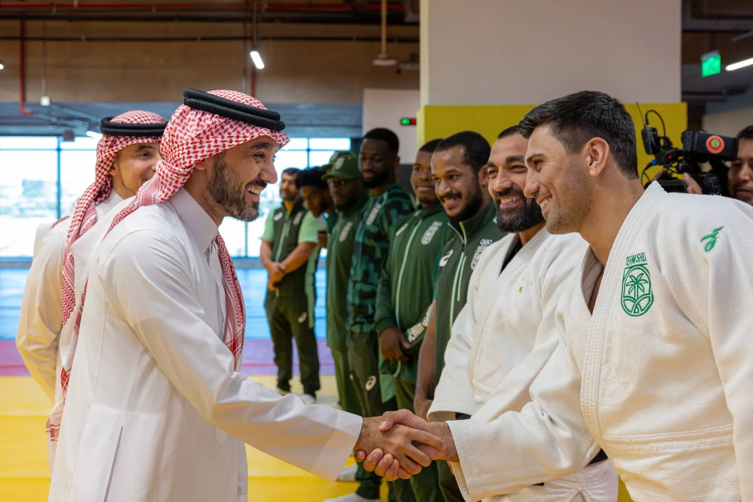 The Minister of Sport meets a number of athletes during the inauguration of the center (Asharq Al-Awsat)