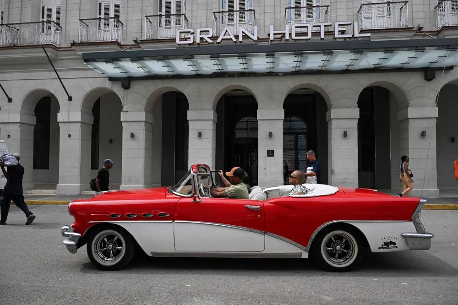 An old car drives past the Gran Hotel Bristol in Havana on June 3, 2026. (AFP) 
