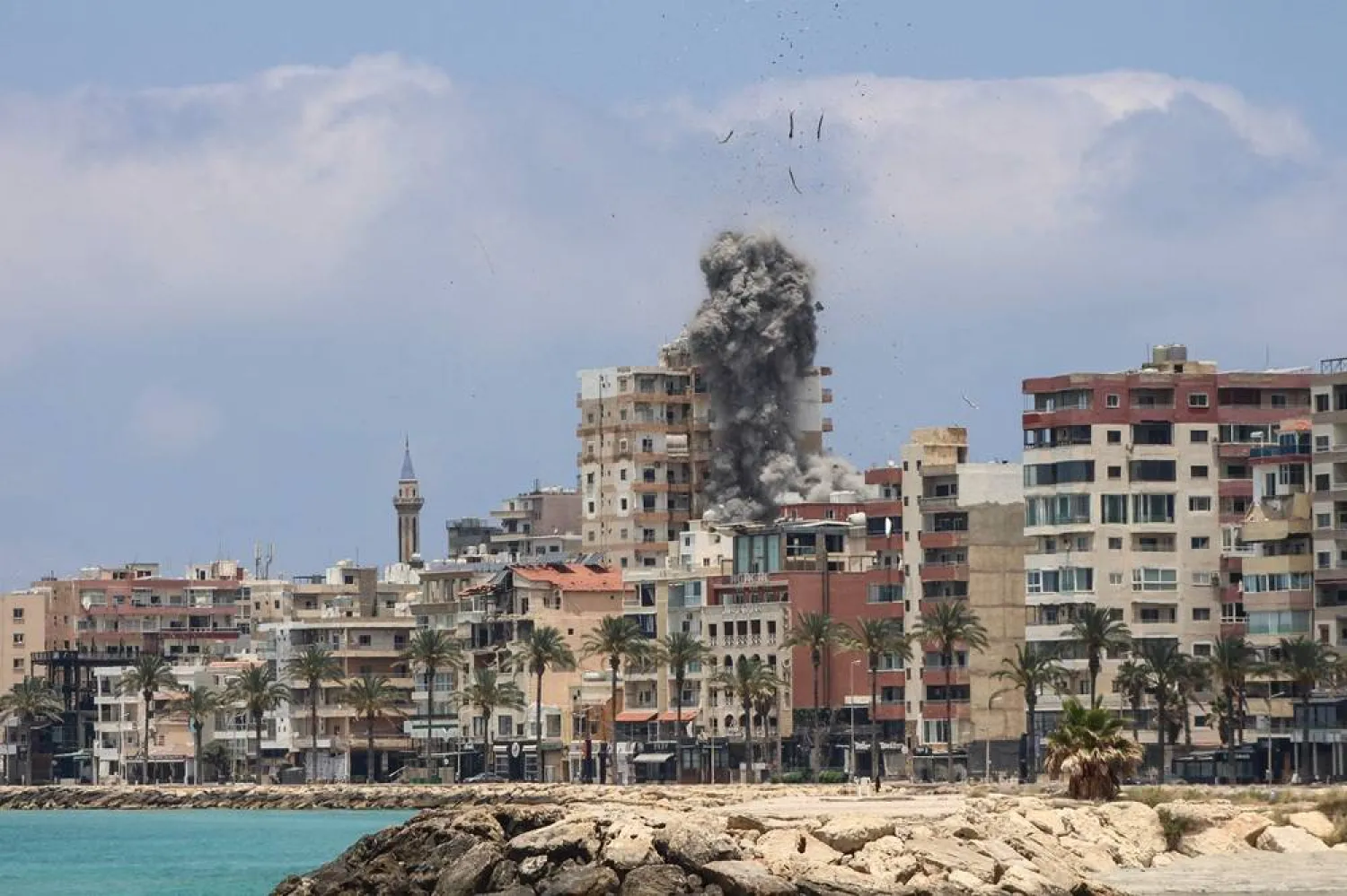 Smoke rises following an Israeli airstrike in the southern city of Tyre on June 9, 2026. (AFP)
