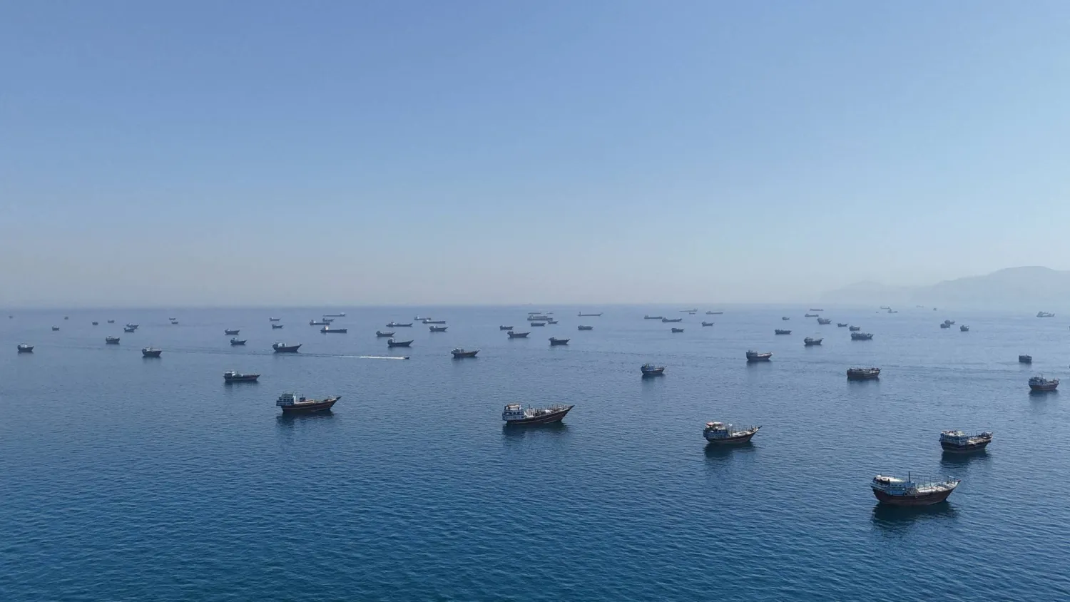 FILE PHOTO: A drone view of vessels anchored in the Strait of Hormuz as seen from Musandam, Oman, June 8, 2026. REUTERS/Stringer/File Photo