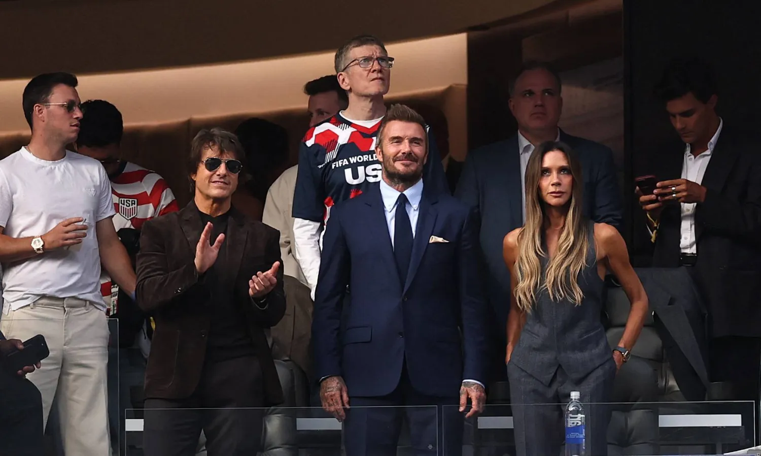 LOS ANGELES, CALIFORNIA - JUNE 12: Tom Cruise, David and Victoria Beckham pictured during the FIFA World Cup 2026 Group D match between USA and Paraguay at Los Angeles Stadium on June 12, 2026 in Los Angeles, California. Stu Forster/Getty Images/AFP  