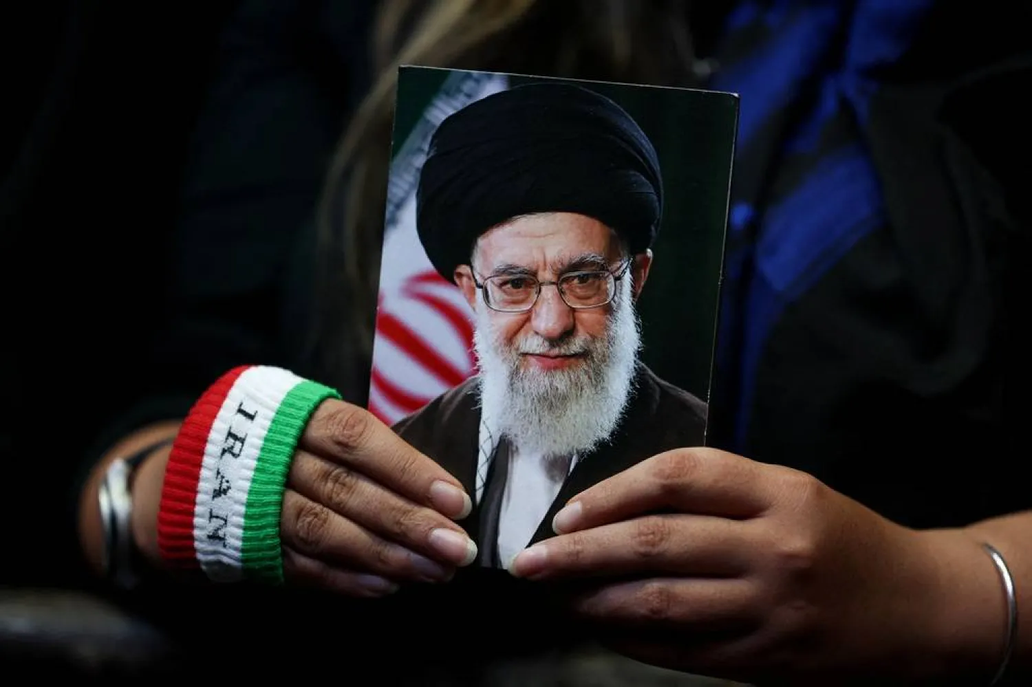 A woman holds an image of late Iranian Supreme Leader Ali Khamenei during a rally in Tehran, Iran, May 29, 2026. Majid Asgaripour/WANA (West Asia News Agency) via Reuters