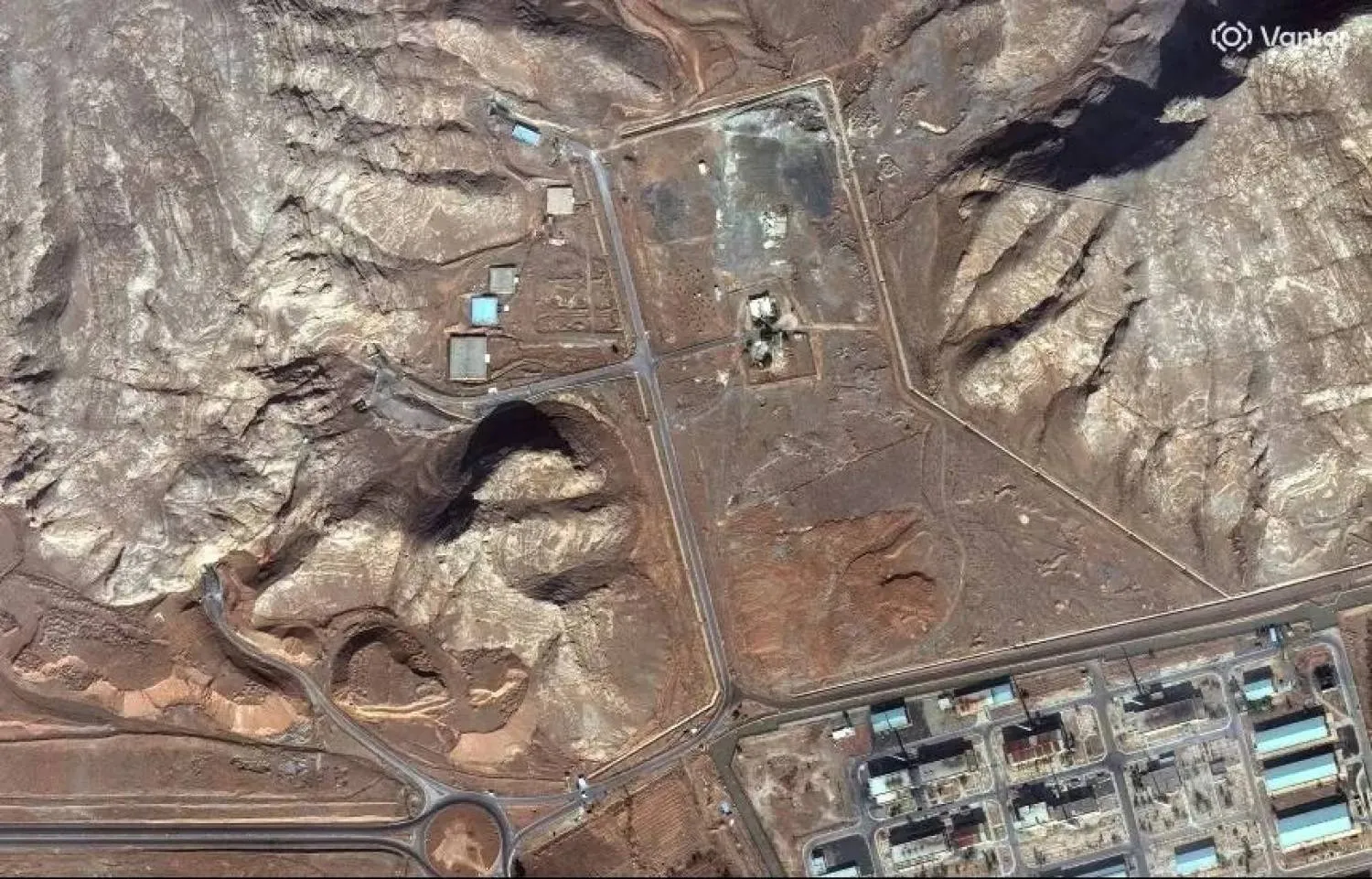 Satellite imagery shows an overview of a tunnel complex carved into rocky terrain near a developed facility area in Isfahan, Iran, on November 11, 2025. Maxar/DigitalGlobe/Getty Images