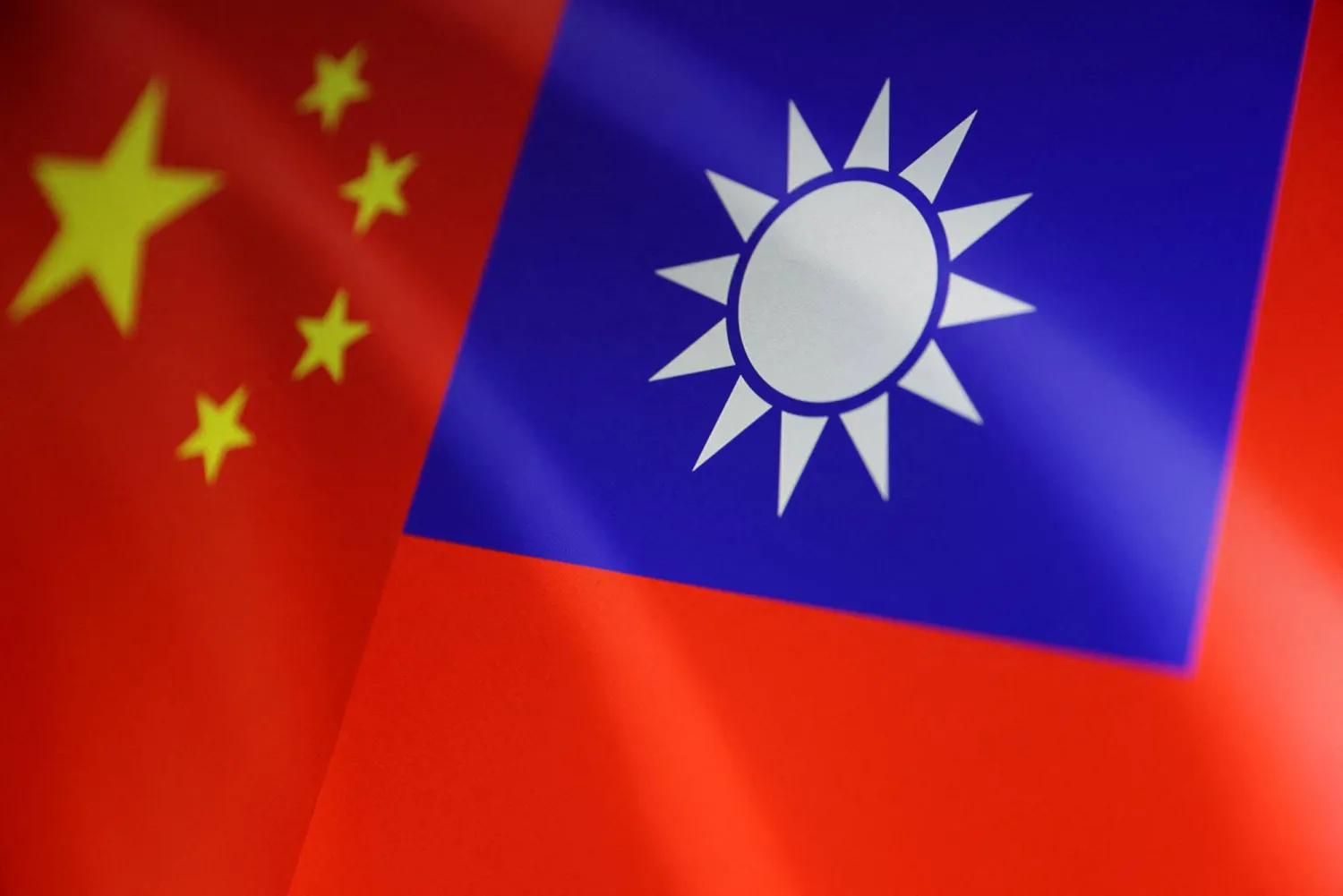 FILE PHOTO: Chinese and Taiwanese flags are seen in this illustration, August 6, 2022. REUTERS/Dado Ruvic/Illustration/File Photo
