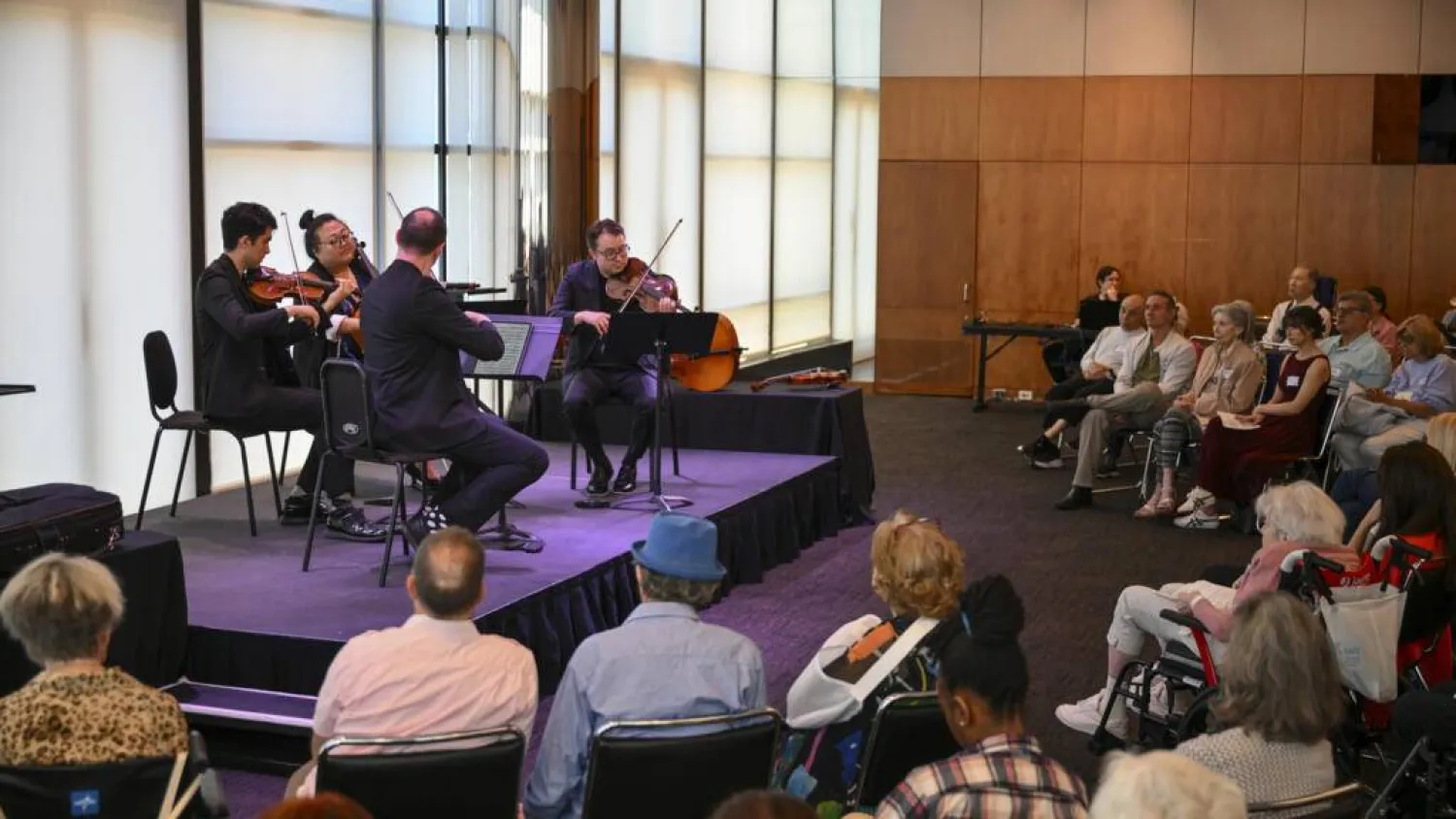 Attendees participate in New York's 'Lincoln Center Moments,' a performance-based program created for people living with dementia and their caregivers. ANGELA WEISS / AFP
