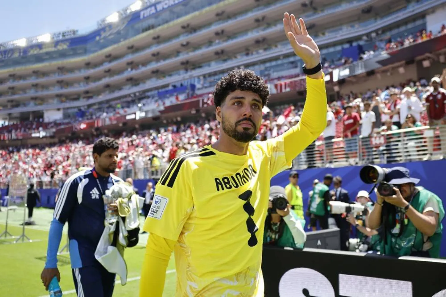 Qatar's goalkeeper Mahmud Abunada greets supporters as he leaves the pitch after the FIFA World Cup 2026 group stage match Qatar against Switzerland, in San Francisco, USA, 13 June 2026. (EPA)