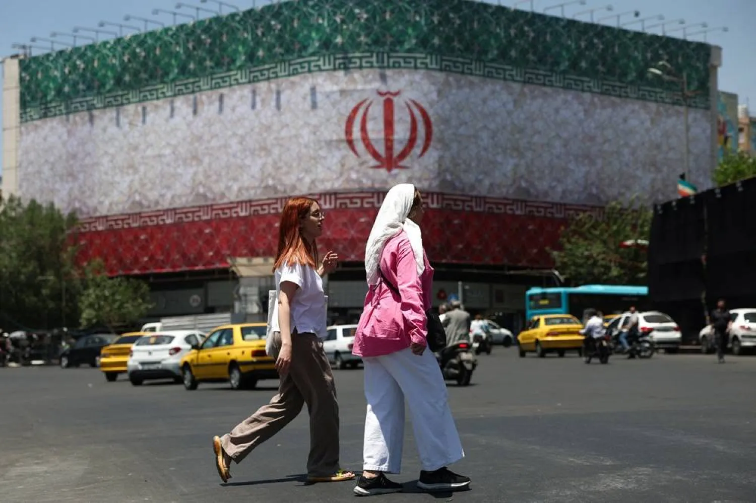 People walk on a street in Tehran, Iran, June 14, 2026. Majid Asgaripour/WANA (West Asia News Agency) via Reuters