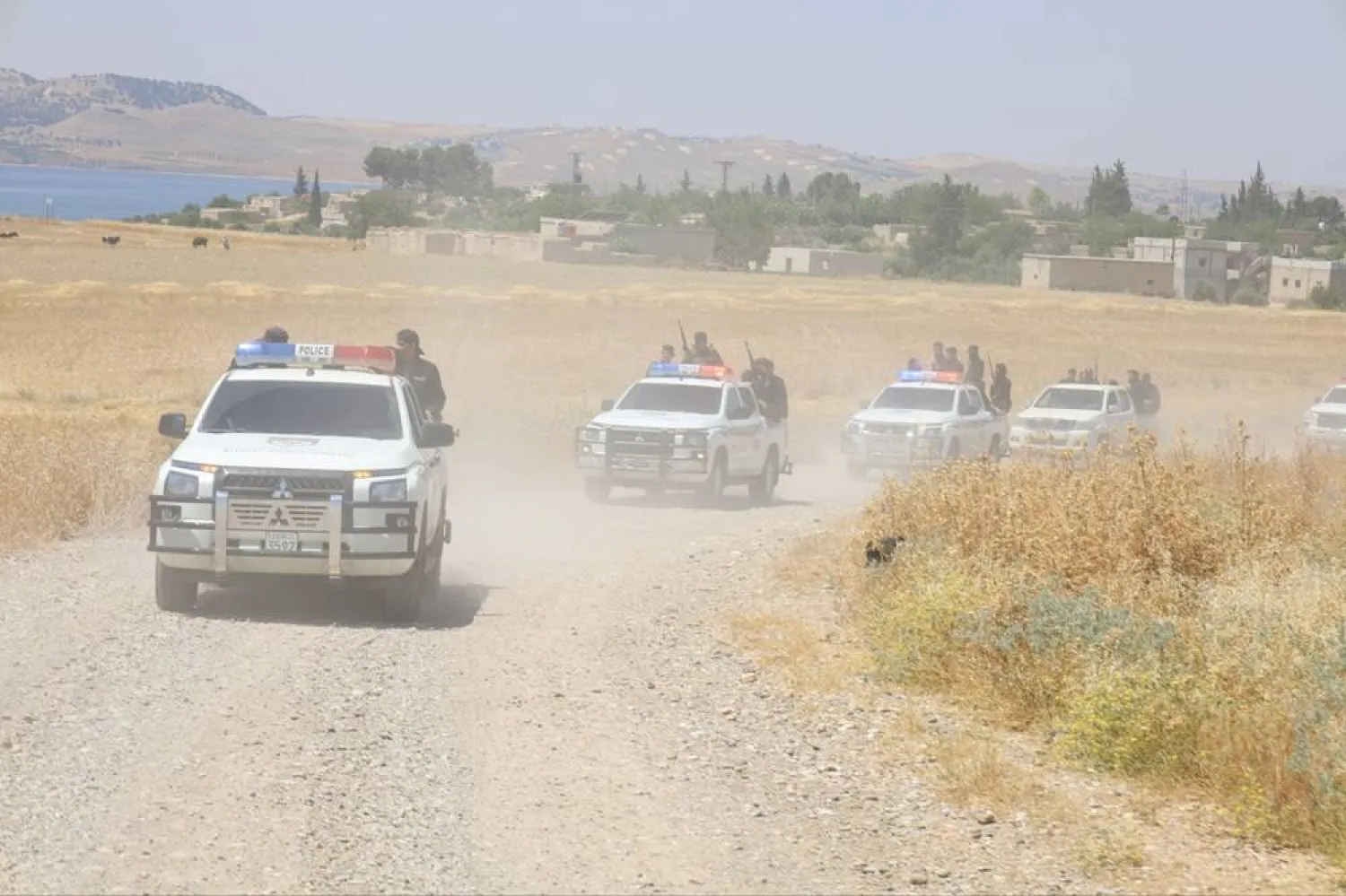 Syrian Internal Security vehicles patrol near Ain al-Arab in eastern Aleppo province after authorities said 20 suspects were arrested in connection with attacks on security checkpoints and facilities. (SANA file)