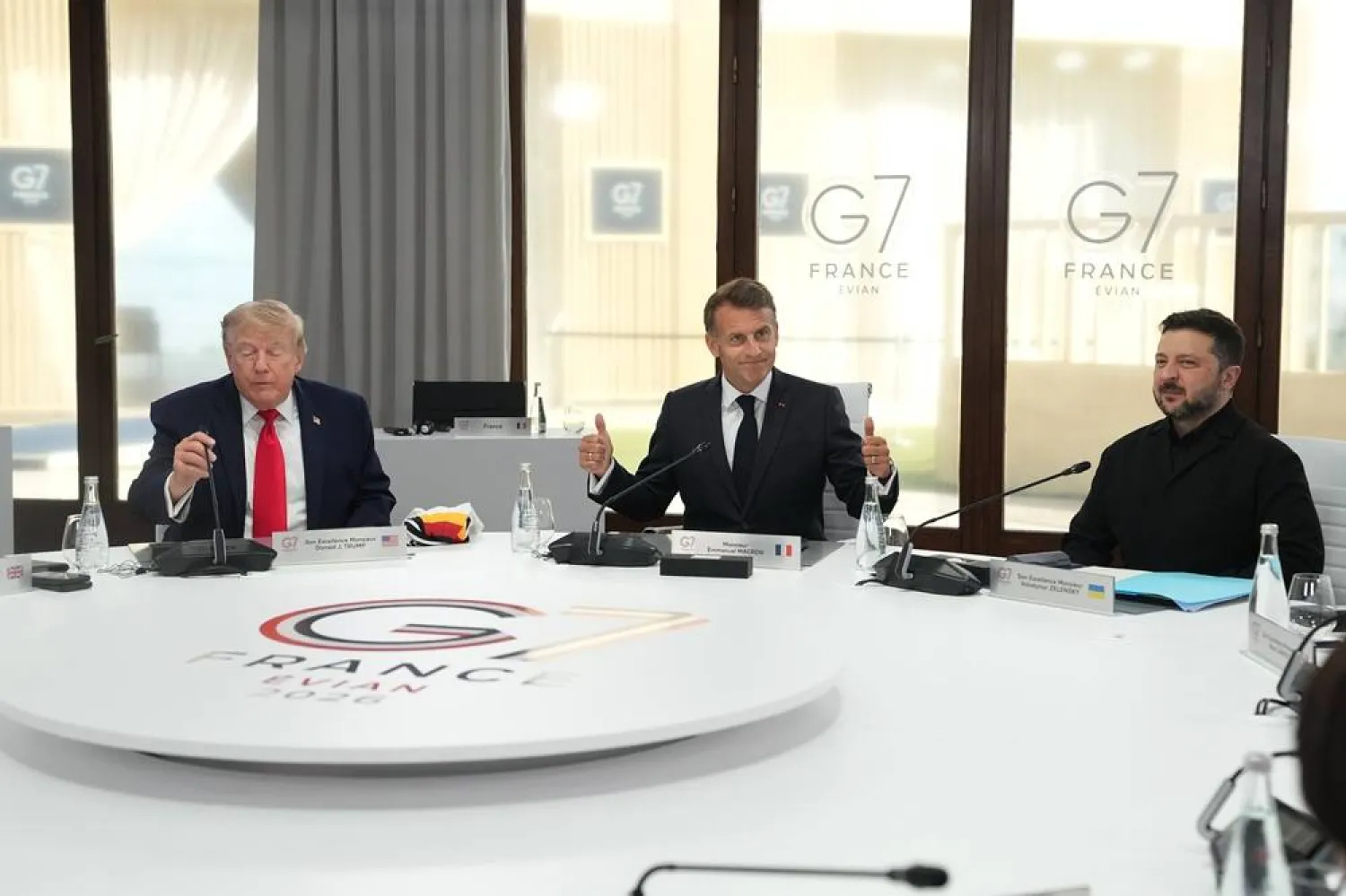 (L-R) US President Donald Trump, French President Emmanuel Macron and Ukrainian President Volodymyr Zelenskyy during a working session at the G7 summit in Evian-les-Bains, France, 16 June 2026. (EPA)