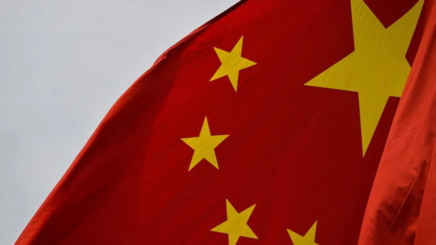 A Chinese flag is seen in Shanghai’s financial district. (AFP file)