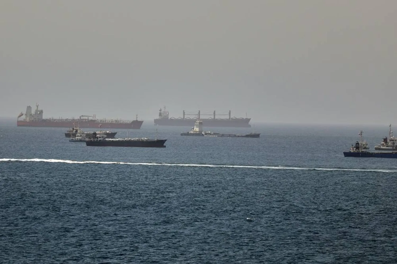 Tankers and cargo vessels are seen in the Gulf of Oman, along shipping routes linking the Strait of Hormuz and the Arabian Sea, Tuesday, June 16, 2026. (AP) 