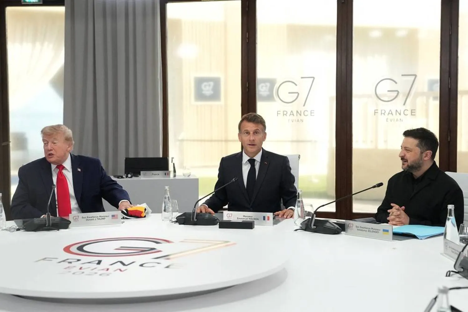 US President Donald Trump, French President Emmanuel Macron and Ukrainian President Volodymyr Zelenskiy during a working session at the G7 summit in Evian-les-Bains, France, June 16, 2026. (Reuters)