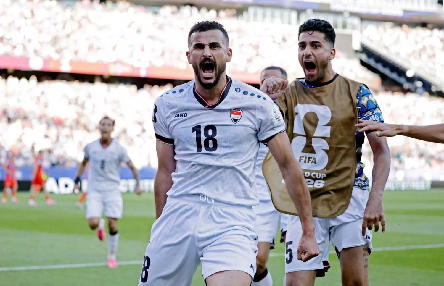 فرحة كبيرة للاعب العراقي أيمن حسين بعد هدفه في شباك النرويج (رويترز)