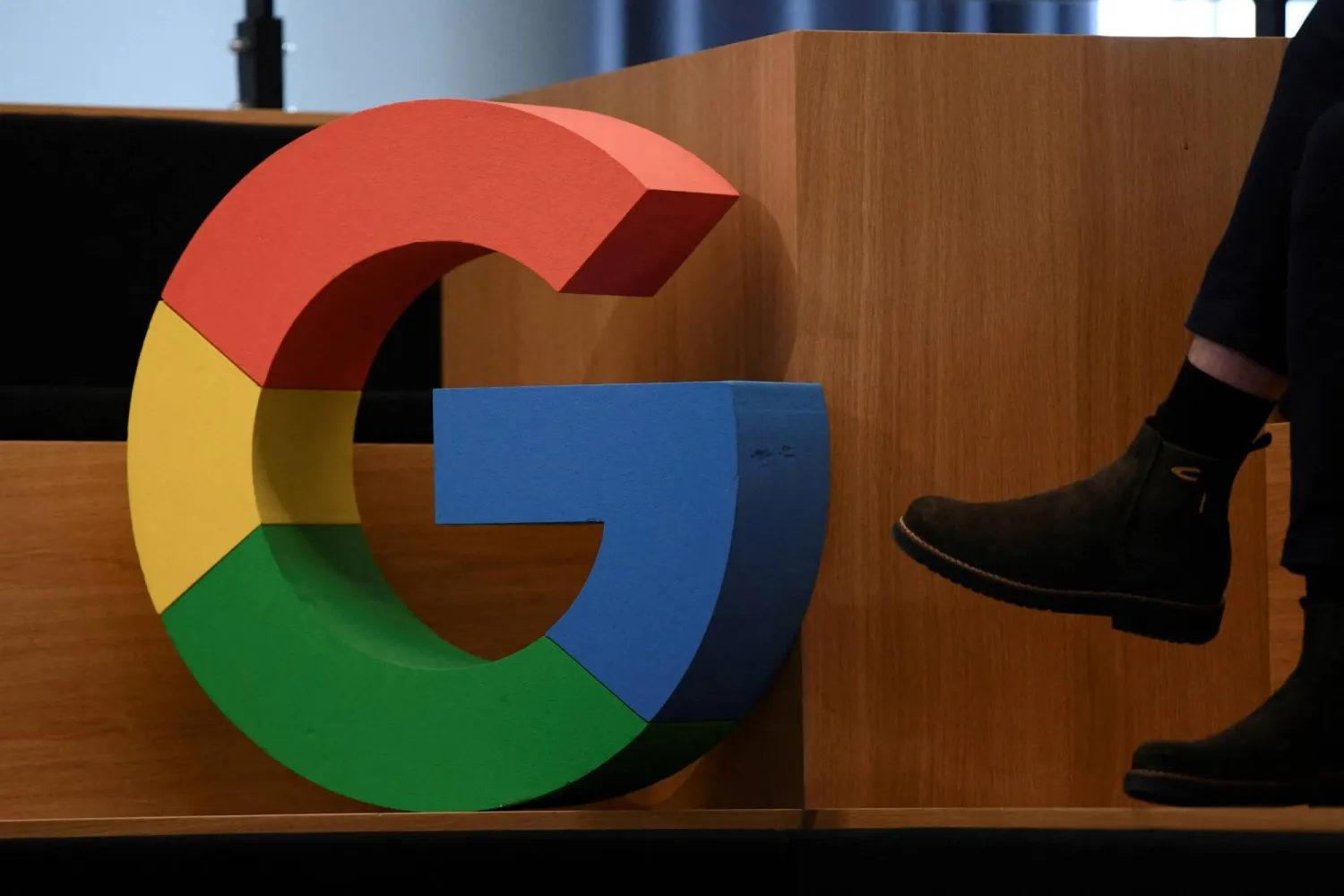FILE PHOTO: A Google sign is pictured during the company's presentation of a detailed investment plan for Germany outside the Google office in Berlin, Germany, August 31, 2021.  REUTERS/Annegret Hilse//File Photo
