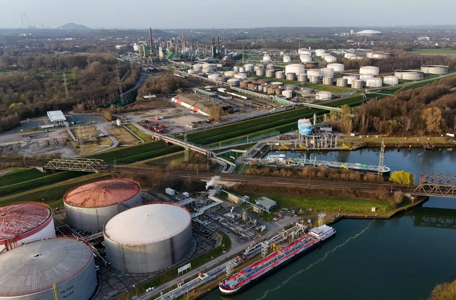 (FILES) This aerial view shows the fuel depot of Aral at the Ruhr Oel petroleum refineries of BP Gelsenkirchen GmbH in Gelsenkirchen, western Germany on March 9, 2026. (Photo by Ina FASSBENDER / AFP)