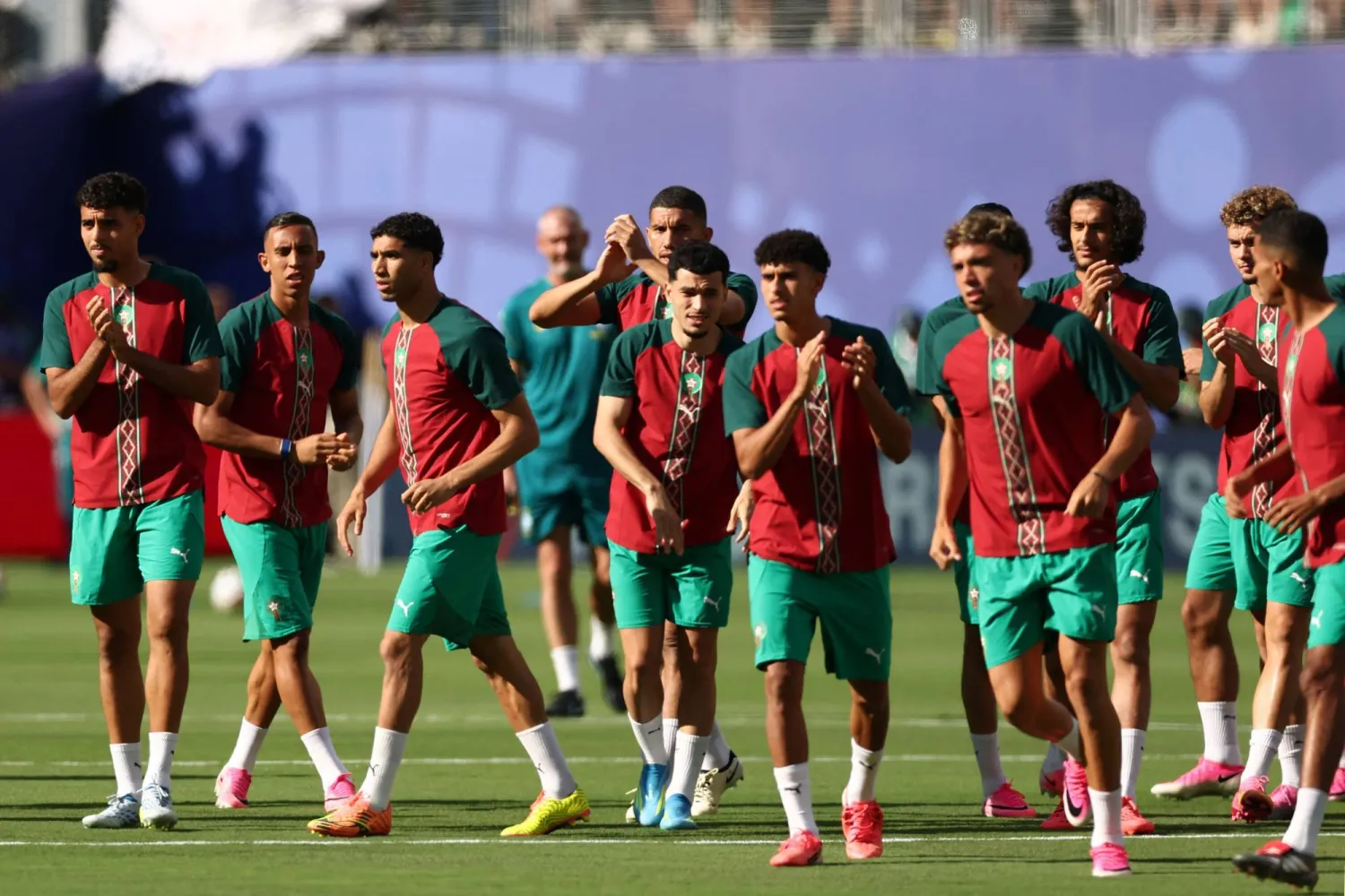 لاعبو المغرب خلال الإستعداد لمواجهة أسكتلندا المفصلية (ا ف ب)