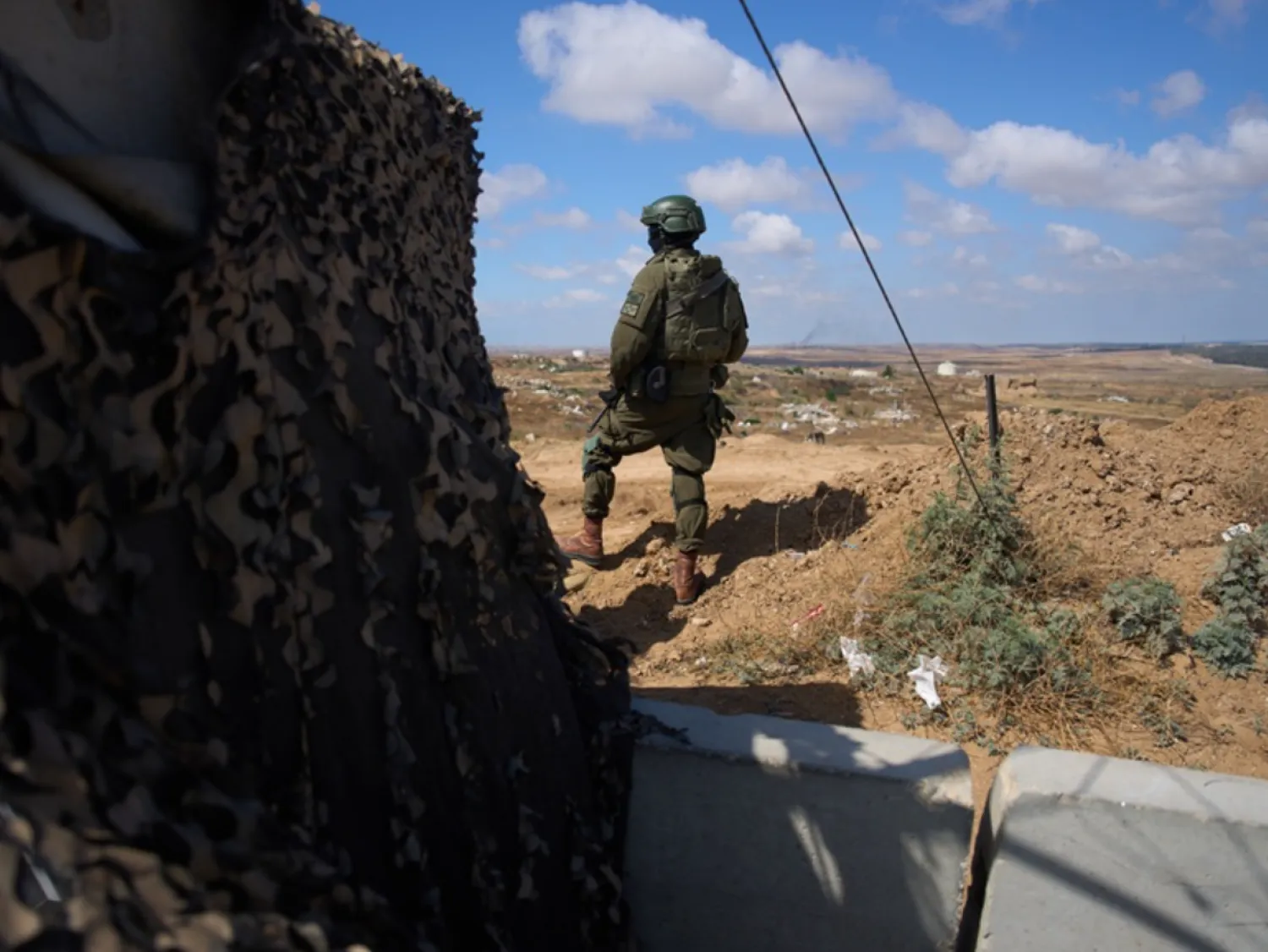 An Israeli soldier occupies a military position overlooking the so-called Yellow Line in the central Gaza Strip, Tuesday, May 26, 2026. (AP Photo/Ariel Schalit)
