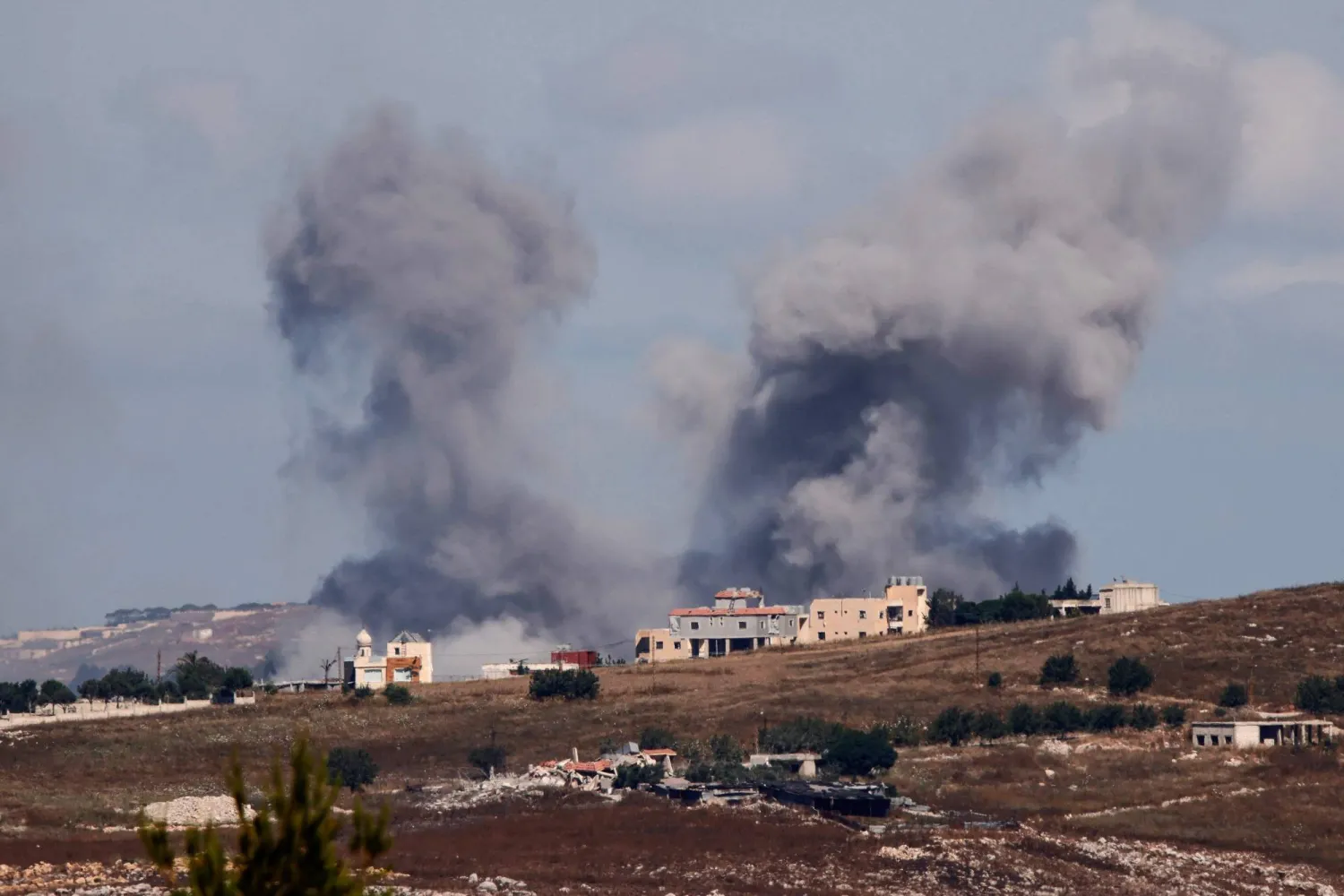 A photograph taken from the southern Lebanese region of Marjayoun shows smoke rising following an Israeli airstrike on the village of Choukine on June 19, 2026. (Photo by AFP) 