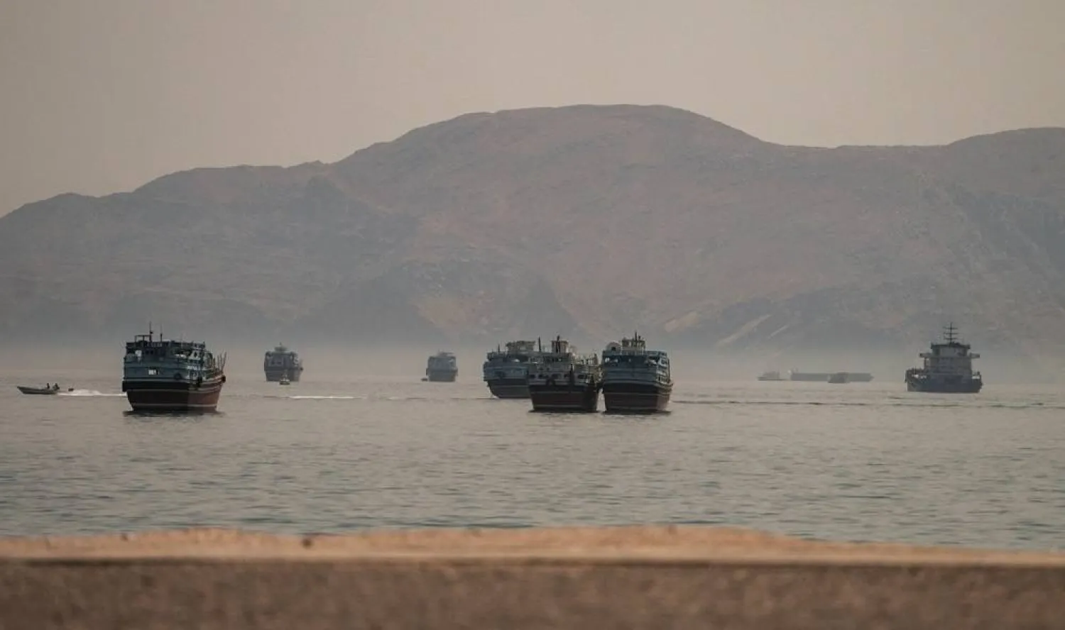  Vessels are anchored in the Strait of Hormuz, as seen from Musandam, Oman, June 19, 2026. (Reuters)