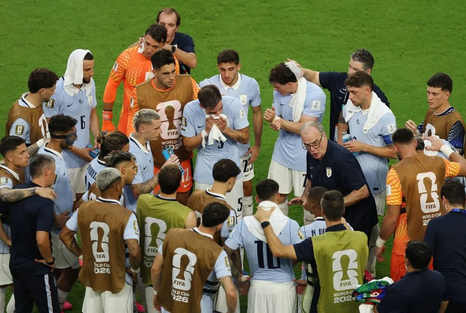 Football - FIFA World Cup 2026 - Group H - Saudi Arabia v Uruguay - Miami Stadium, Miami Gardens, Florida, US - June 15, 2026 Uruguay coach Marcelo Bielsa speaks to his players during the second half hydration break. (Reuters)