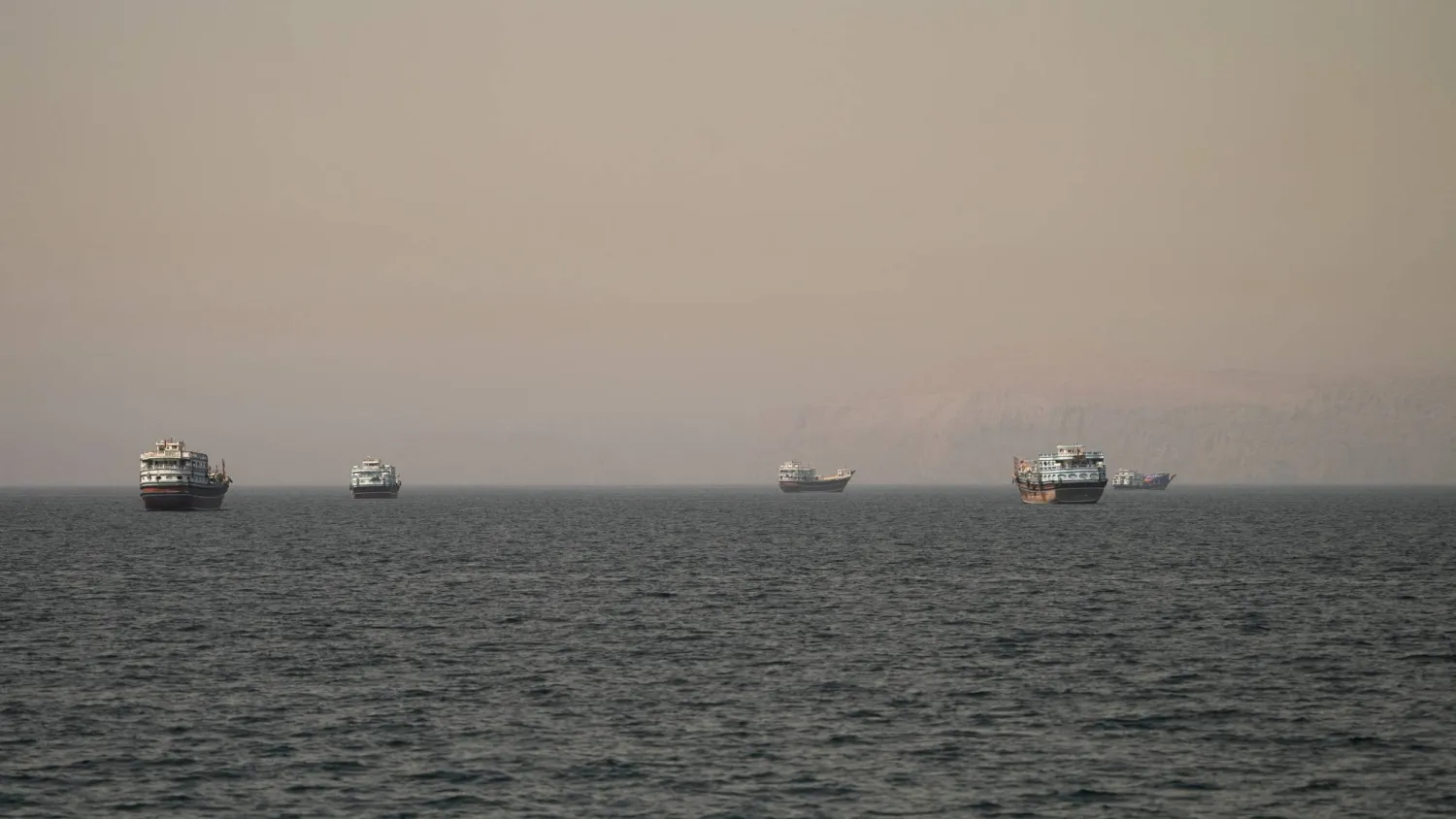  Vessels at the Strait of Hormuz, as seen from Musandam, Oman, June 18, 2026. (Reuters)