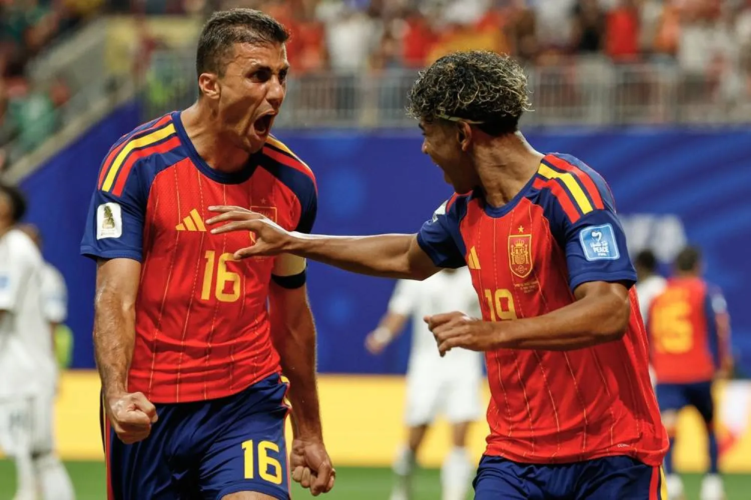  Spain's Lamine Yamal celebrates with teammate Rodri, left, after scoring his side's opening goal during the World Cup Group H soccer match between Spain and Saudi Arabia in Atlanta, Sunday, June 21, 2026. (AP) 