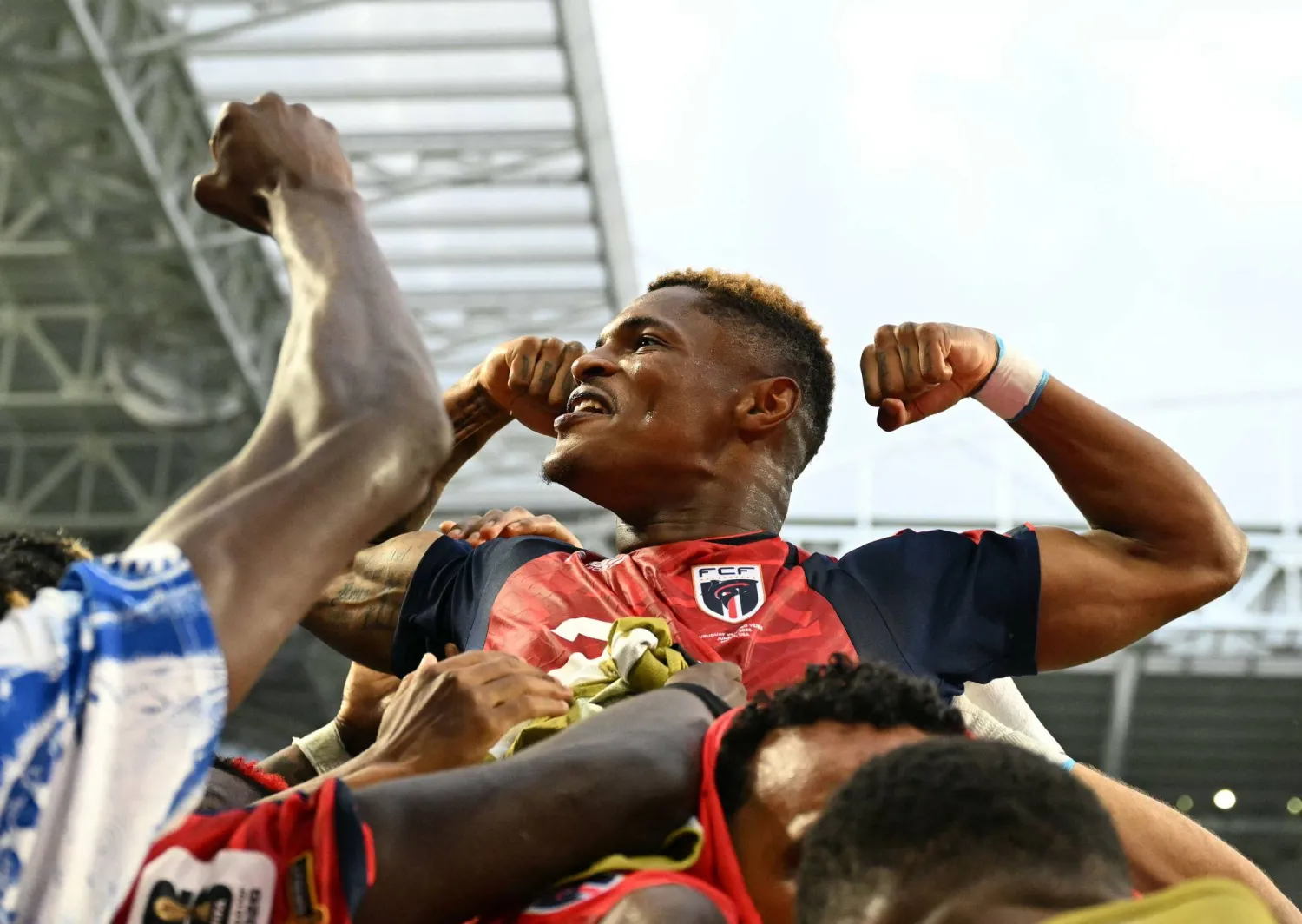 Cape Verde's forward #26 Helio Varela celebrates with teammates after scoring his team's second goal during the 2026 World Cup Group H football match between Uruguay and Cape Verde at the Miami Stadium in Miami Gardens on June 21, 2026. (AFP)