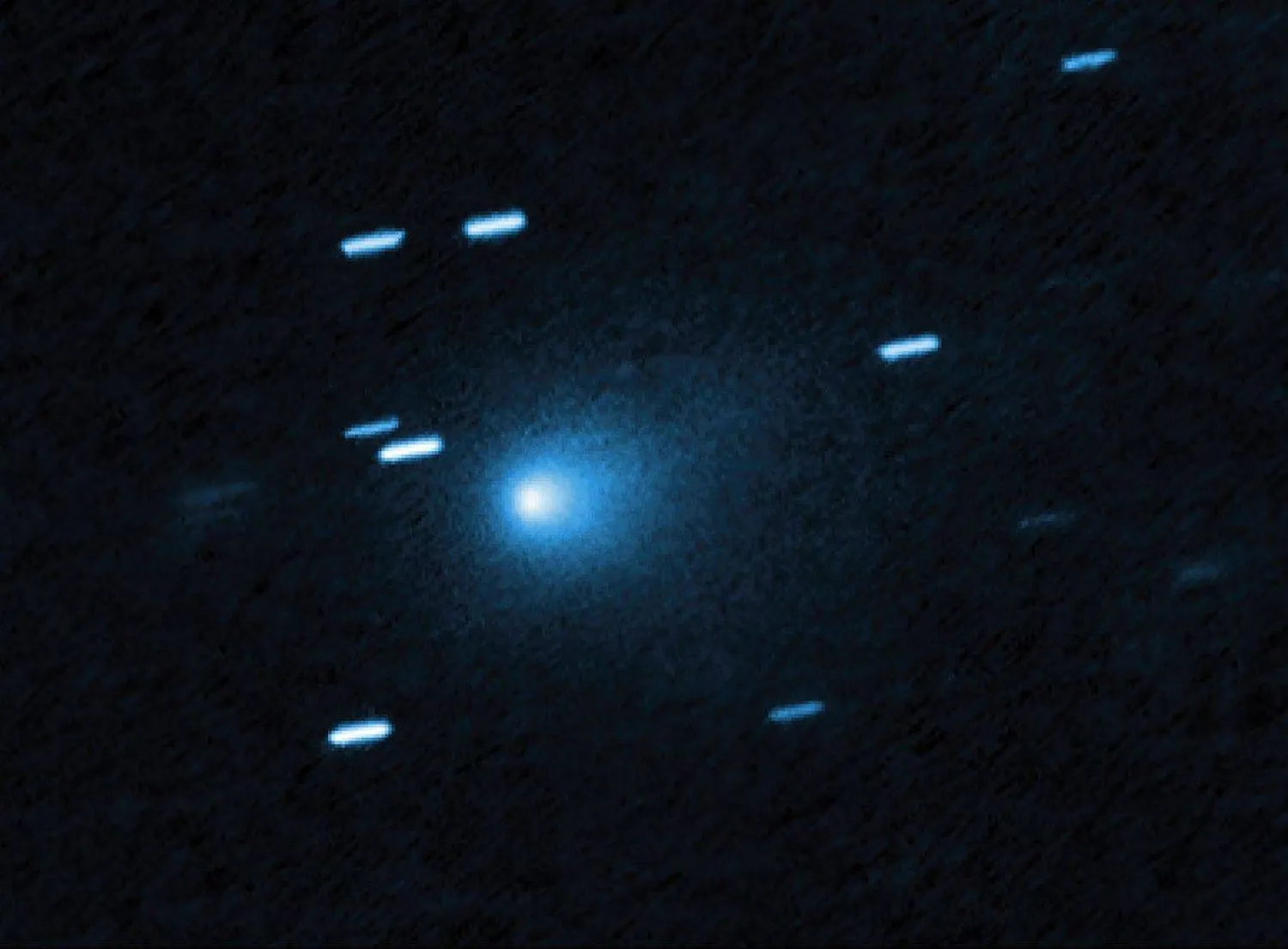 This handout photograph released by NASA on June 22, 2026, shows a view taken by Hubble of the interstellar comet 3I/ATLAS on July 21, 2025, when the comet was 277 million miles from Earth. "AFP photo / NASA / ESA / David Jewitt (UCLA)"