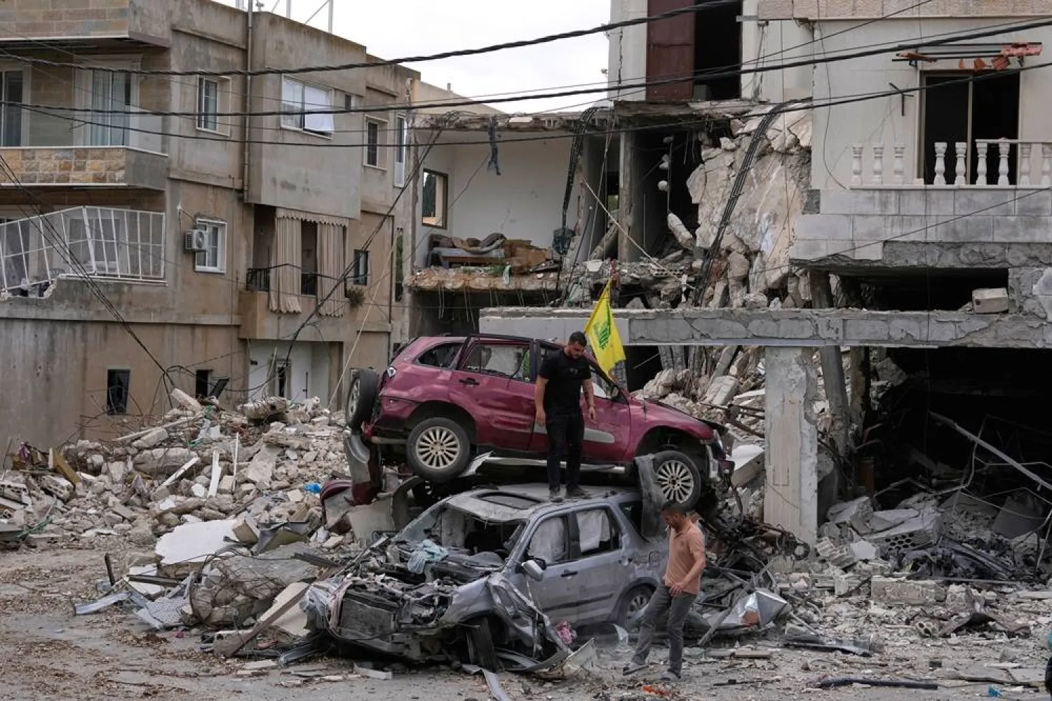  People check destroyed cars following a ceasefire between Israel and Hezbollah in the village of Mayfadoun, southern Lebanon, Monday, June 22, 2026. (AP) 