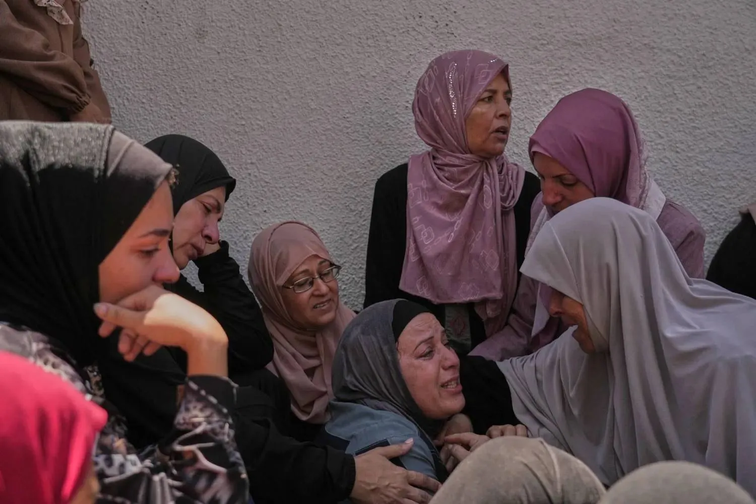 Mourners grieve for Palestinian woman Shahd Ashour, who was killed in an Israeli airstrike on Monday in Gaza City (AP). 