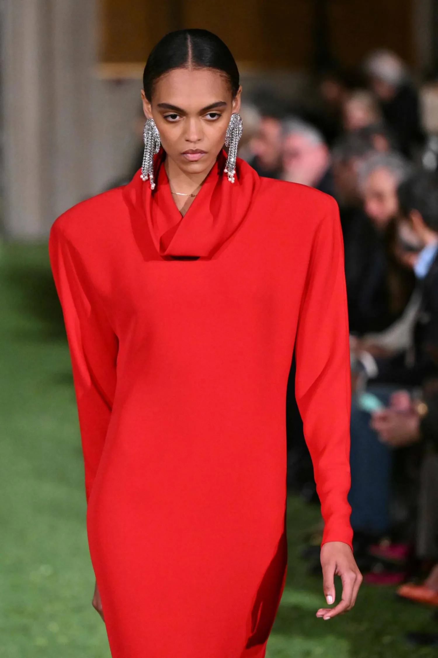 A model presents a creation by Italian fashion house Valentino during the show "Interferenze" Fall/Winter 2026-2027 collection at Palazzo Barberini in Rome on March 12, 2026. (Photo by Alberto PIZZOLI / AFP)