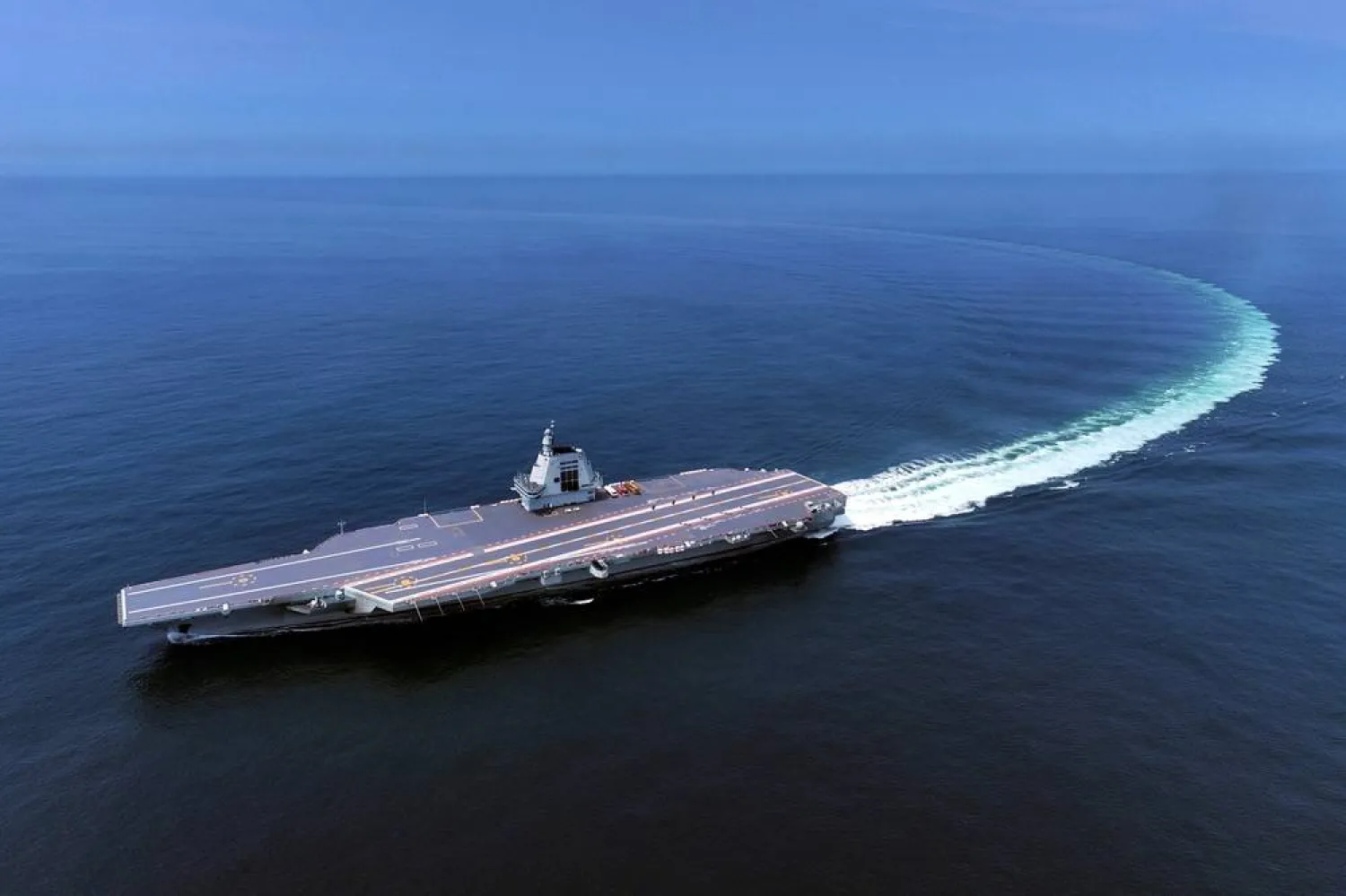 In this photo released by Xinhua News Agency, China's third conventionally powered aircraft carrier, the Fujian, conducts a maiden sea trial on May 7, 2024. (Ding Ziyu/Xinhua via AP, File) 