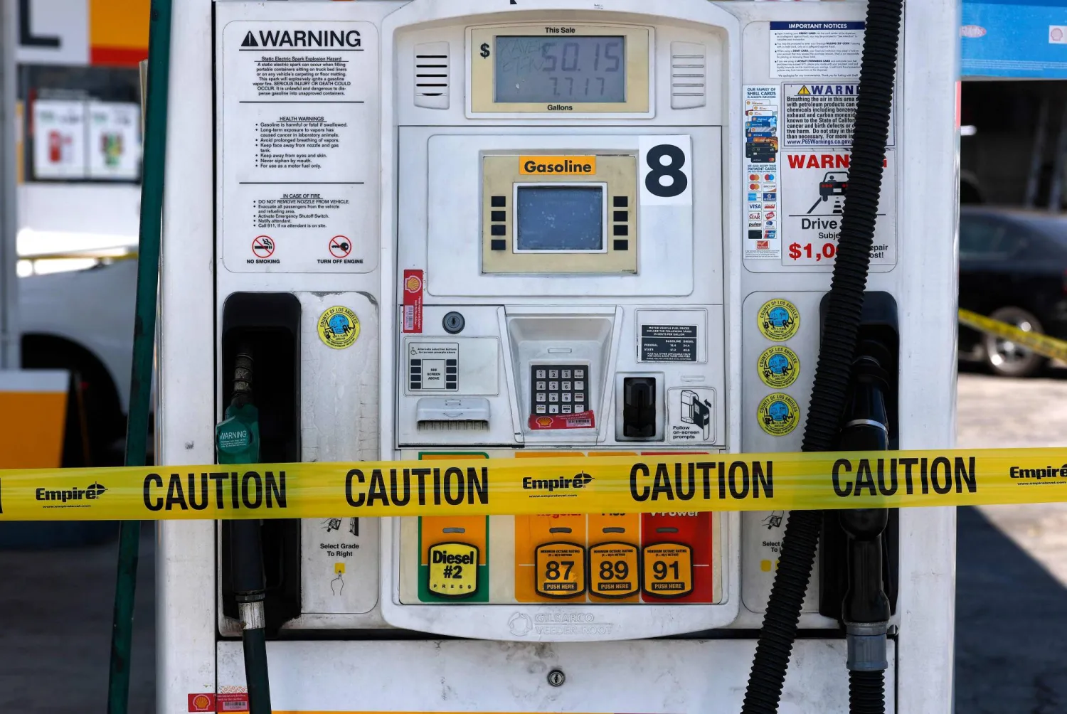 LOS ANGELES, CALIFORNIA - JUNE 22: Yellow caution tape is seen wrapped around a gas pump at a Shell gas station on June 22, 2026 in Los Angeles, California. Justin Sullivan/Getty Images/AFP 