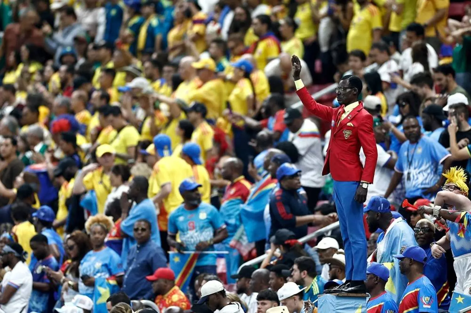 Democratic Republic of Congo's supporter Michel Kuka Mboladinga, pays tribute to Democratic Republic of Congo's late prime minister Patrice Lumumba, by remaining motionless ahead of the 2026 World Cup Group K football match between Colombia and Democratic Republic of Congo at the Guadalajara Stadium in Zapopan on June 23, 2026. (AFP) 